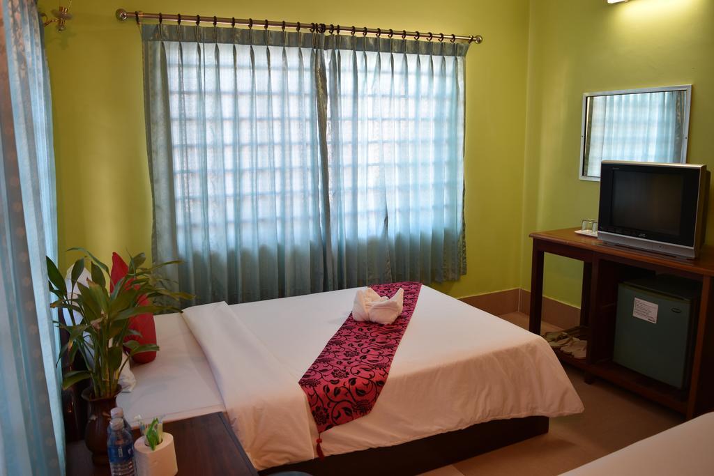 Ta Som Guesthouse & Tour Services Siem Reap Quarto foto